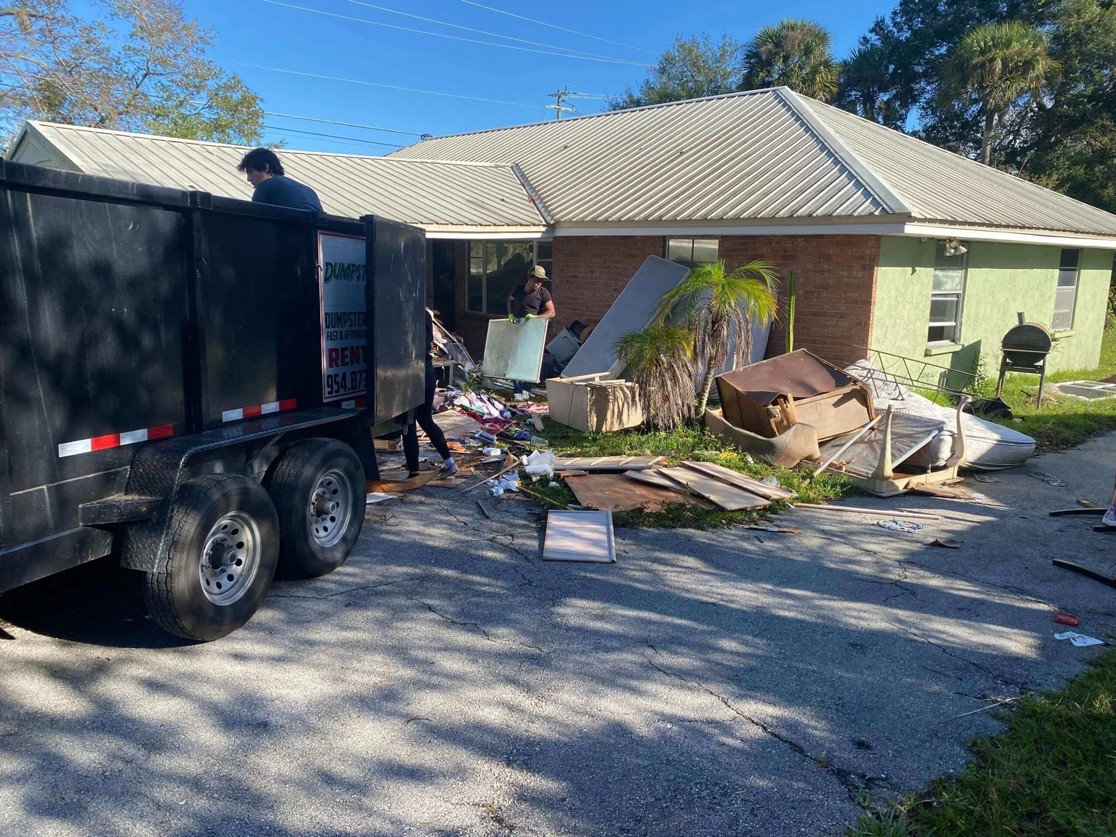 Before — property full of junk and debris